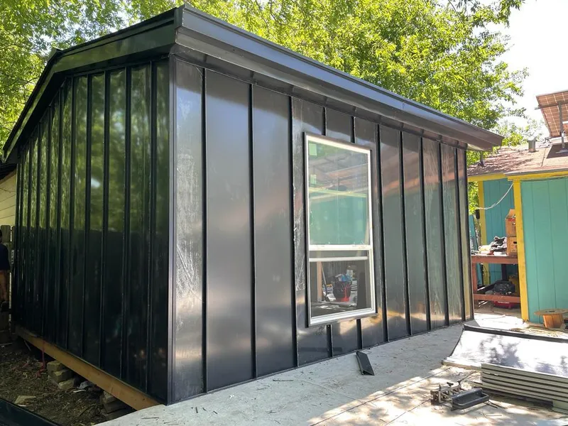 Black standing seam metal wall panels for Metal Roof Installation in Egg Harbor